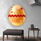 Easter egg sticker with orange shell, red details, and white flower accents