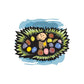 Easter egg sticker with cartoon bunny and colorful eggs inside green grass frame