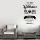 Wall decal with “Eat Drink and Celebrate” and wedding details in black script and text