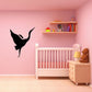 Egret flapping decal, black bird silhouette in mid-flight on a wall