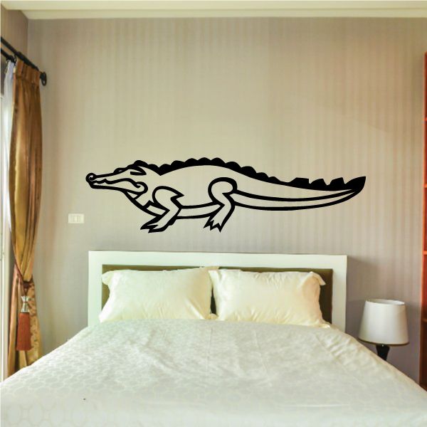 Egyptian crocodile decal, black outline with stylized hieroglyph-like patterns