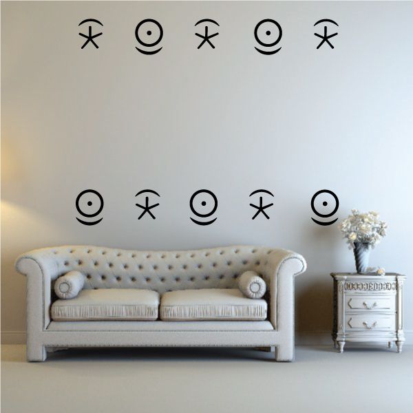 Eye and star wall decals with Egyptian-style black symbols, in a row