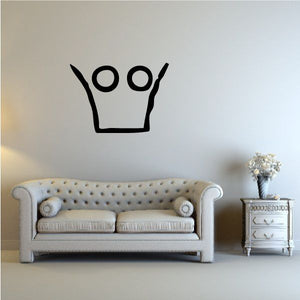 Black crown wall decal with circular eye-like symbols on top