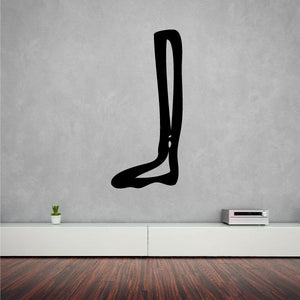 Black stylized foot decal with Egyptian hieroglyph motif