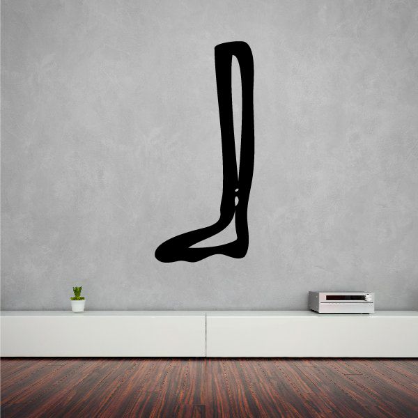 Black stylized foot decal with Egyptian hieroglyph motif