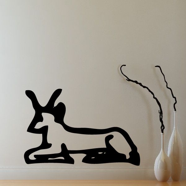 Egyptian hieroglyphic-style seated bull wall decal, black silhouette