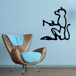 Seated cat decal with Egyptian hieroglyph-style symbols in black
