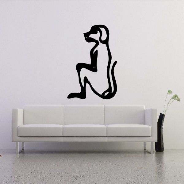 Seated dog wall decal with Egyptian-style hieroglyphic pattern, black outline