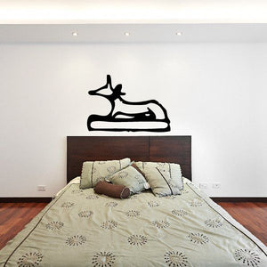 Egyptian hieroglyphics wall decal, black stylized figure sitting on base