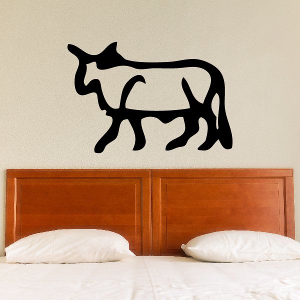 Egyptian hieroglyphics wall decal with a black bull silhouette