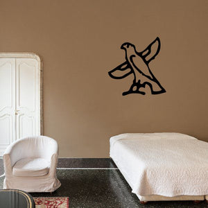 Egyptian hieroglyph wall decal in black vinyl, stylized bird-like character