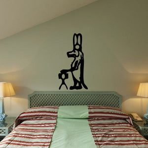 Black Egyptian hieroglyphics wall decal with stylized figure and symbols