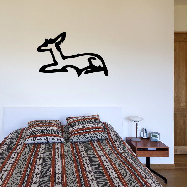 Egyptian hieroglyphics wall decal, black stylized script figure