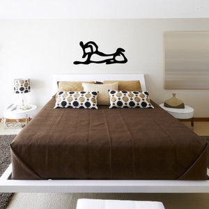 Egyptian hieroglyphics wall decal, black vinyl symbols on a light wall.