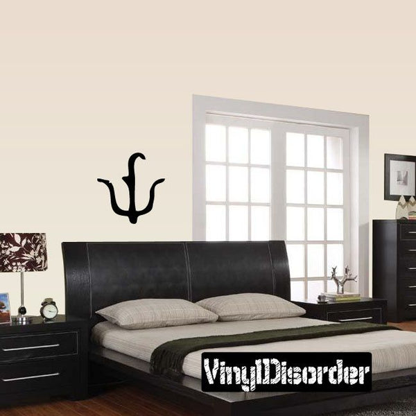 Black Egyptian hieroglyph wall decal with birdlike symbol