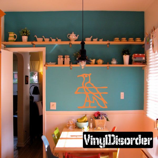 Egyptian hieroglyphics wall decal vinyl with orange animal figure on teal wall
