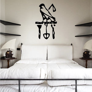 Egyptian hieroglyph wall decal, black bird and symbol design on indoor wall