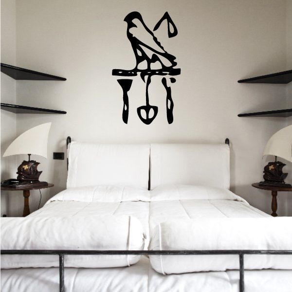 Egyptian hieroglyph wall decal, black bird and symbol design on indoor wall