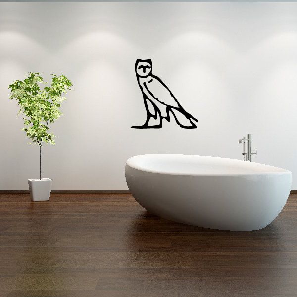 Egyptian hieroglyph wall decal with black stylized bird/figure silhouette