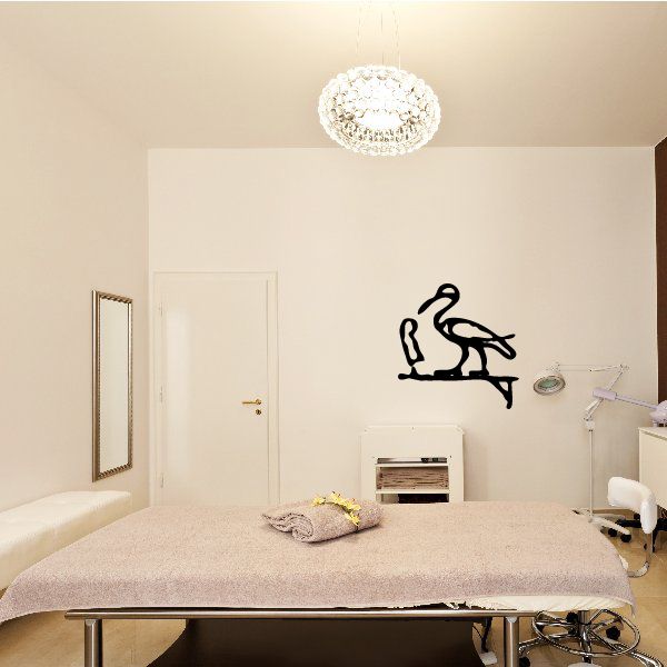Egyptian hieroglyphics wall decal with black symbol figures, vinyl lettering