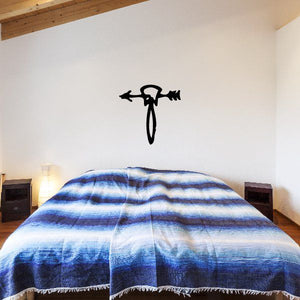 Egyptian hieroglyphics wall decal with black bird-like symbol
