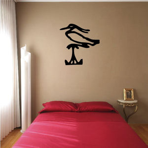 Black Egyptian hieroglyphics vinyl wall decal with stylized symbol shape