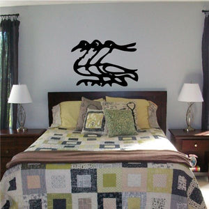 Egyptian-style hieroglyphics vinyl wall decal, black symbol on light wall
