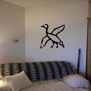Black Egyptian hieroglyphics wall decal with stylized figure and feather-like shape