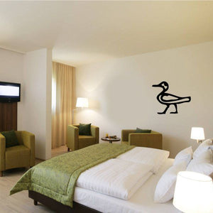 Egyptian hieroglyphics wall decal, dark symbol on bedroom wall above bed