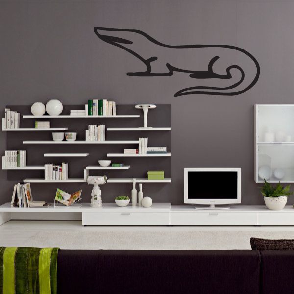 Egyptian lizard decal with black outline silhouette on wall