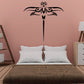 Elegant dragonfly wall decal, black ornamental silhouette with long thin tail.
