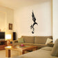 Bird wall decal in black, with curled treble-clef style music flourish