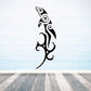 Black tribal dolphin decal with swirling splash and ornate tail