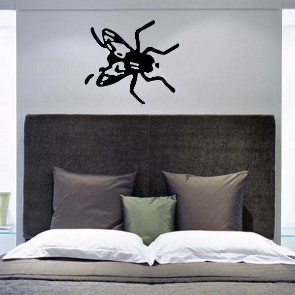 Winged fly wall decal with black silhouette