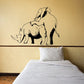 Animal wall decal of an elephant and rhino in black and beige line art