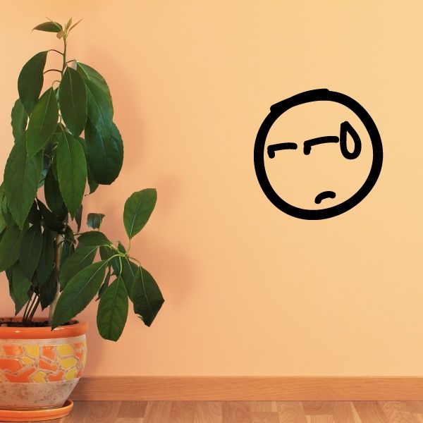 Black circular doodle face vinyl wall decal with simple expression lines