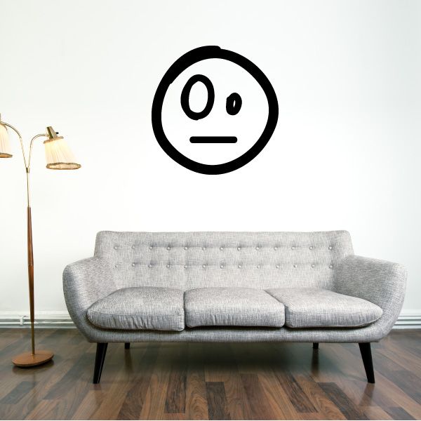 Vinyl wall decal with a black smiley face in a circular outline