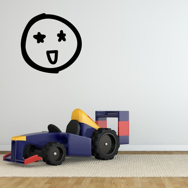 Vinyl wall decal of a black circle emoticon with stars and a frowning mouth
