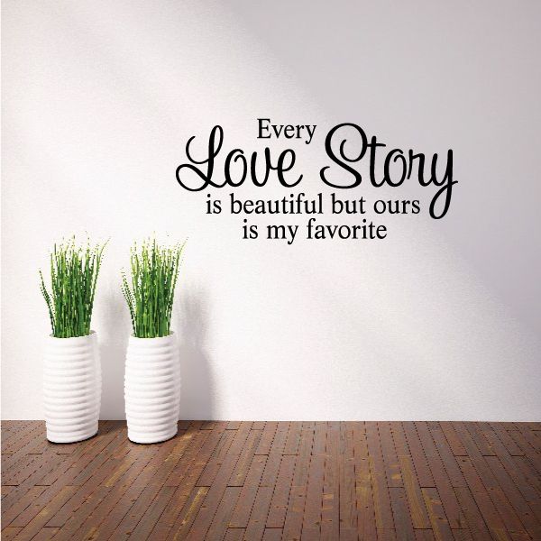 Wall decal in black cursive: 'Every Love Story is beautiful but ours is my favorite'