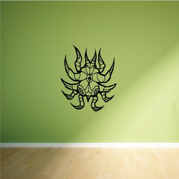 Stylized black beetle decal with horned, web-like legs design