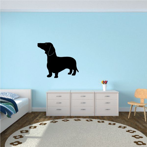 Black dachshund decal with excited stance, side view