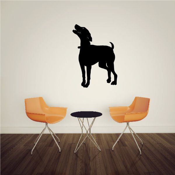 Black dog silhouette decal with excited tail pose