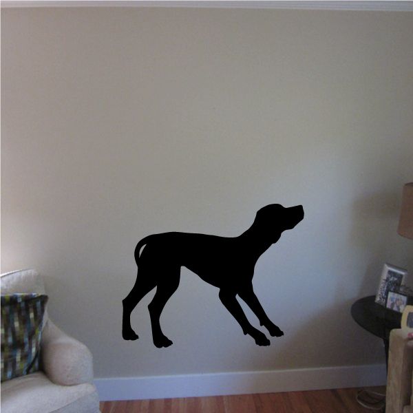 Excited hound decal with black dog silhouette mid-run