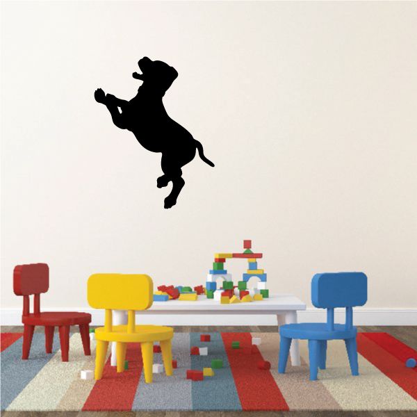 Black excited puppy wall decal with jumping silhouette