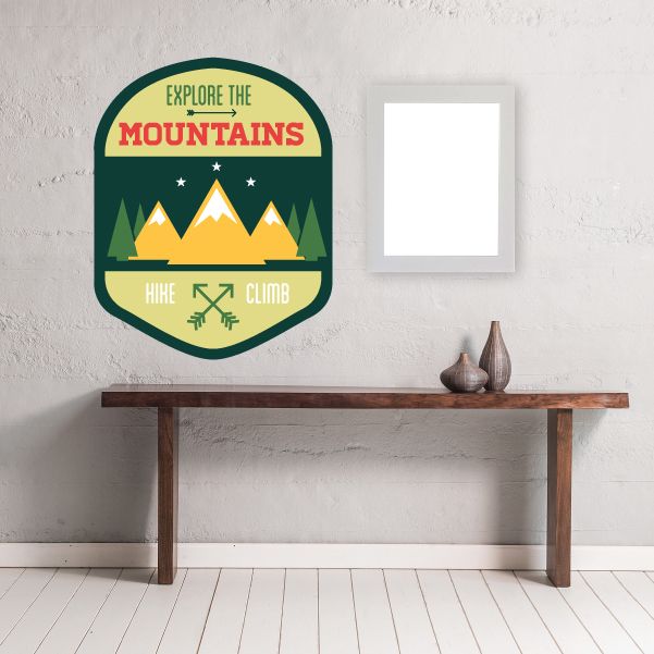 Vinyl wall decal badge: 'Explore the Mountains' with mountains and pine trees