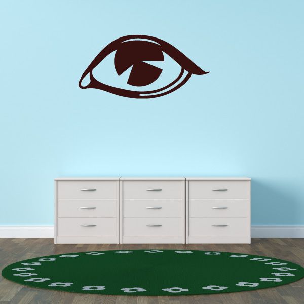 Staring eye decal with dark brown eye on green circular background