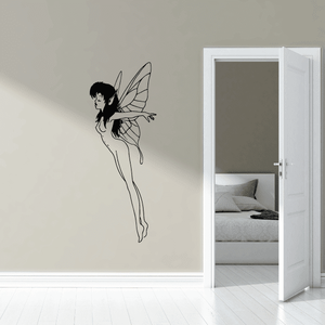 Fairy on tiptoes wall decal of a black silhouette girl with wings
