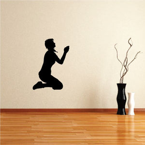 Praying woman silhouette wall decal, black faith-themed figure kneeling
