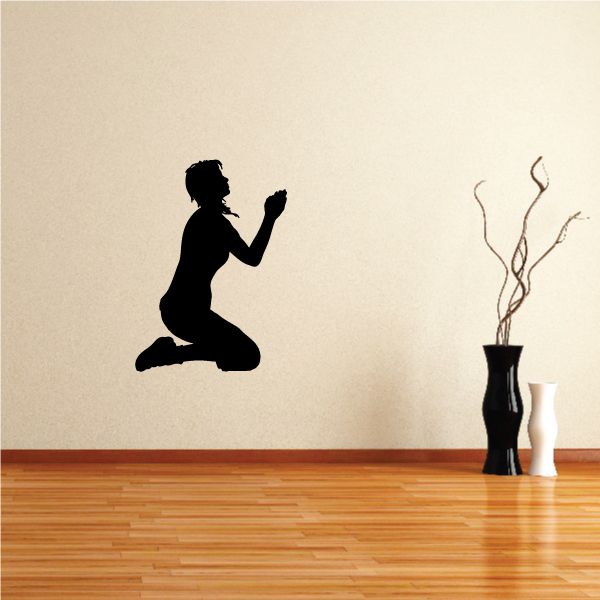 Praying woman silhouette wall decal, black faith-themed figure kneeling