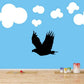 Black falcon drifting decal with outstretched wings and tail feathers
